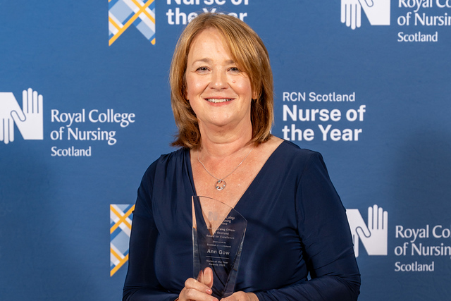 Ann Gow receiving her award of excellence